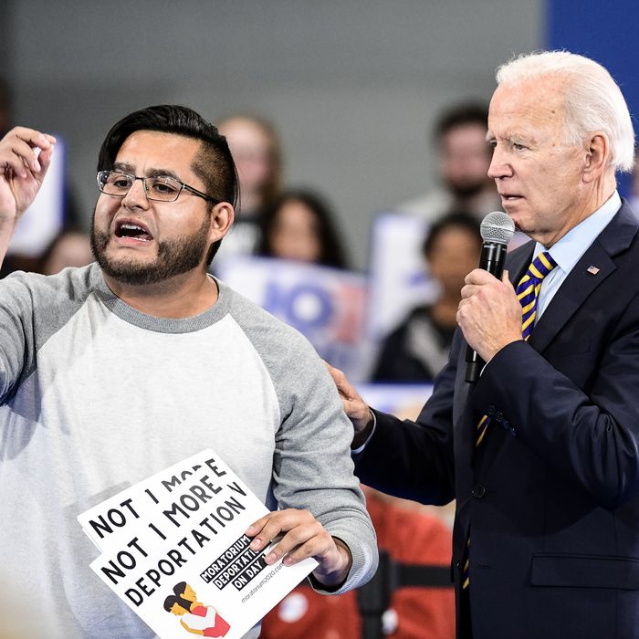 Joe Biden (right) with immigrant-rights activist Carlos Rojas.