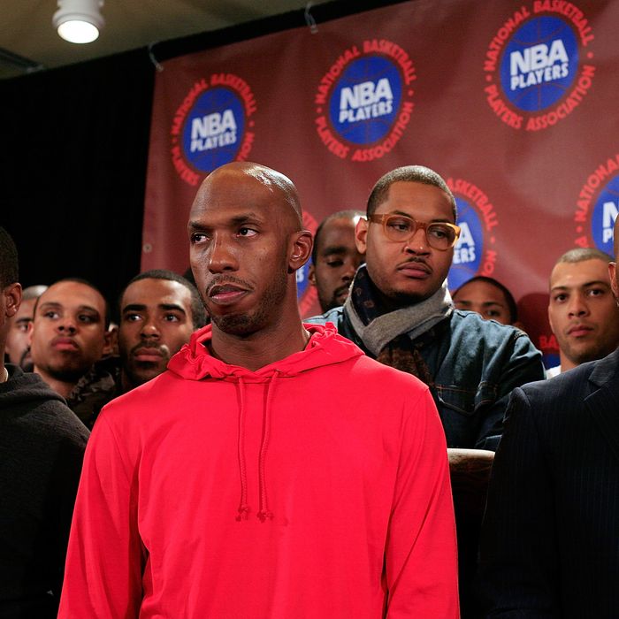 NEW YORK, NY - NOVEMBER 14: Chauncey Billups, Carmelo Anthony, and Derek Fisher, President of the National Basketball Players Association, listen as Billy Hunter, Executive Director of the National Basketball Players Association speaks at a press conference after National Basketball Players Association met to discuss the current CBA offer at Westin Times Square on November 14, 2011 in New York City. (Photo by Patrick McDermott/Getty Images)