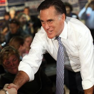 FAIRFAX, VA - OCTOBER 26: Republican presidential candidate and former Massachusetts Gov. Mitt Romney shakes hands at the headquarters of the Fairfax County Republican Committee October 26, 2011 in Fairfax, Virginia. Romney campaigned with Virginia Gov. Bob McDonnell and thanked phone bank volunteers for their efforts in an upcoming state election. (Photo by Win McNamee/Getty Images)
