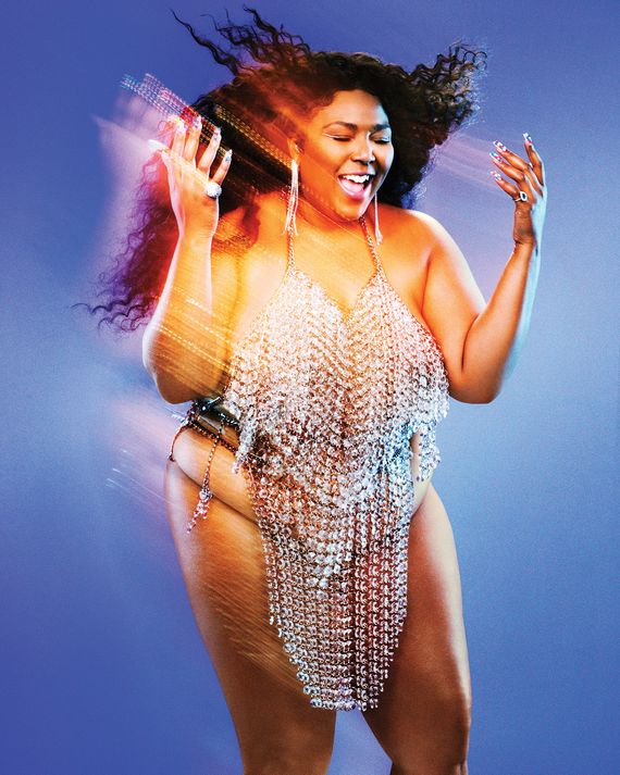 Lizzo proudly shows off her figure as she announces launch of new