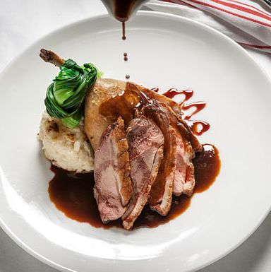 duck, cauliflower gratin, bok choy, pomegranate jus