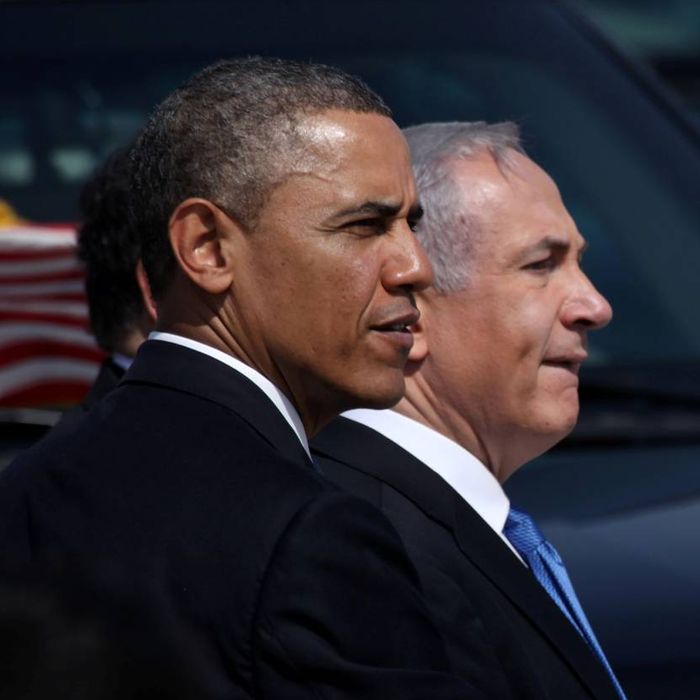 TEL AVIV, ISRAEL - MARCH 20: U.S. President Barack Obama (L) is greeted by Israeli Prime Minister Benjamin Netanyahu during an official welcoming ceremony on his arrival at Ben Gurion International Airport on March, 20, 2013 near Tel Aviv, Israel. This will be Obama's first visit as president to the region, and his itinerary will include meetings with the Palestinian and Israeli leaders as well as a visit to the Church of the Nativity in Bethlehem. (Photo by Marc Israel Sellem-Pool/Getty Images)