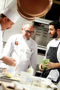 Michael Schwartz and chef Michael Pirolo of Scarpetta Miami overseeing hors d'oeuvres in the Breakers kitchen.