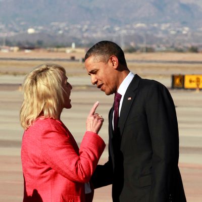 Arizona Gov. Jan Brewer points during an intense conversation with President Barack Obama after he arrived at Phoenix-Mesa Gateway Airport, Wednesday, Jan. 25, 2012, in Mesa, Ariz. 