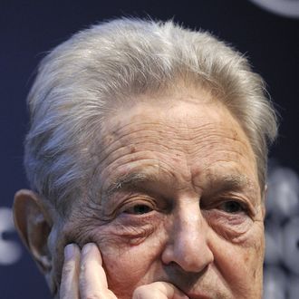A Hungarian-American financier George Soros looks on during a session entitled 
