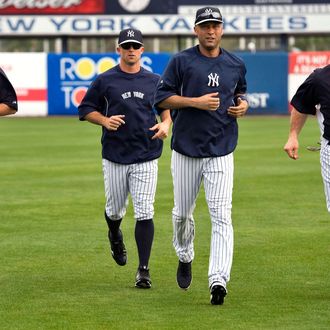 New York Yankees' Ichiro Suzuki (L-R), Brett Gardner, Derek Jeter and Kevin Youkilis run during a workout at the team's MLB spring training complex at George M. Steinbrenner Field in Tampa, Florida, February 24, 2013.