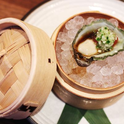 Kumamoto oyster with ponzu-watermelon pearls and cucumber mignonette.