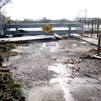 November 1,2012. Four days after hurricane Sandy slammed into the New york area residents of Gerritsen Beach Brooklyn work on recovering from the storms disasterous path.Coming back after evacuating their homes people are dealing with flooding,power outages,lack of utilities and no drinking water.