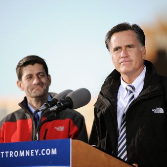 LANCASTER, OH - OCTOBER 12: Republican presidential candidate, former Massachusetts Gov. Mitt Romney (R) and Republican vice presidential candidate, U.S. Rep. Paul Ryan (R-WI) speak on stage at a rally on October 12, 2012 in Lancaster, Ohio. The two were campaigning a day after Ryan's debate with U.S. Vice President Joe Biden. (Photo by Jamie Sabau/Getty Images)