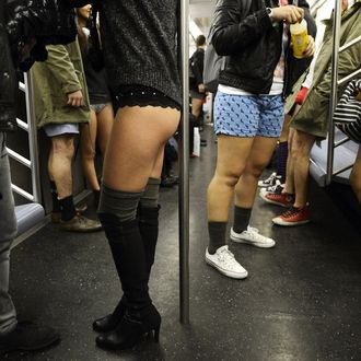 Some riders in the New York City subway in the underwear as the take part in the 2013 No Pants Subway Ride January 13, 2013. Started by Improv Everywhere, the goal is for riders to get on the subway train dressed in normal winter clothes (without pants) and keep a straight face. 