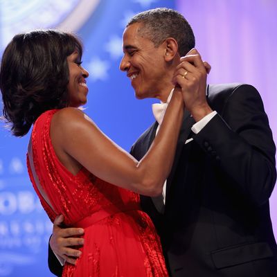 WASHINGTON, DC - JANUARY 21: U.S. President Barack Obama and first lady Michelle Obama dance together during the Comander-in-Chief's Inaugural Ball at the Walter Washington Convention Center January 21, 2013 in Washington, DC. Obama was sworn-in for his second term of office earlier in the day. (Photo by Chip Somodevilla/Getty Images)