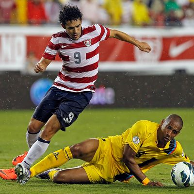 Forward Herculez Gomez #9 of Team USA battles defender Marc Joseph #5 of Team Antigua and Barbuda for the ball during the FIFA World Cup Qualifier Match at Raymond James Stadium on June 8, 2012 in Tampa, Florida. 