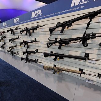  An attendee looks at Smith & Wesson M&P15 MOE Mid rifles at the Smith & Wesson booth at a gun show January 17, 2012 in Las Vegas, Nevada. 