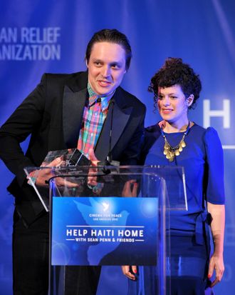 Musicians Win Butler (L) and Regine Chassagne of Arcade Fire speak onstage at the Cinema For Peace event benefitting J/P Haitian Relief Organization in Los Angeles held at Montage Hotel on January 14, 2012 in Los Angeles, California. (Photo by Alberto E. Rodriguez/Getty Images For J/P Haitian Relief Organization and Cinema For Peace)