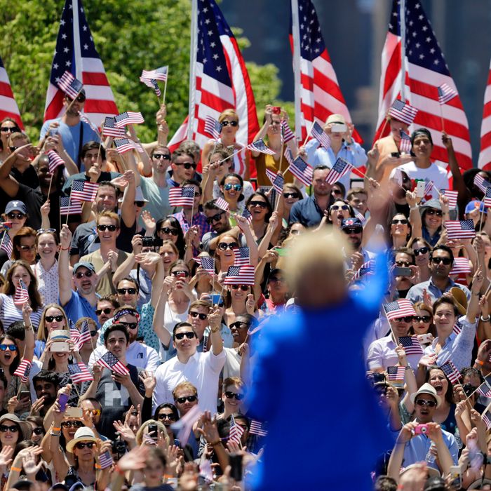 Hillary Clinton waves to supporters Saturday, June 13, 2015, on Roosevelt Island in New York.