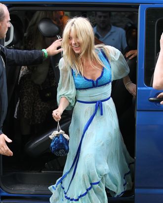 This is Kate getting out of the car to have drinks with her bridal party today. No, we don't know what's up with the dress. Do you?