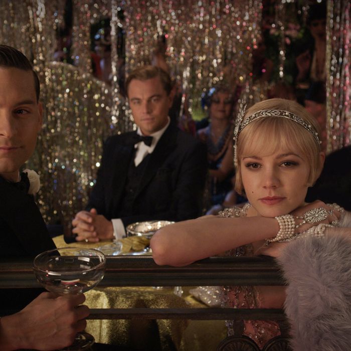 (L-r) TOBEY MAGUIRE as Nick Carraway, LEONARDO DICAPRIO as Jay Gatsby, CAREY MULLIGAN as Daisy Buchanan and JOEL EDGERTON as Tom Buchanan in Warner Bros. Pictures’ and Village Roadshow Pictures’ drama “THE GREAT GATSBY,” a Warner Bros. Pictures release.