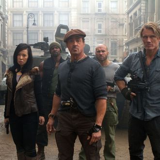 Maggie (Yu Nan, front left), Barney Ross (Sylvester Stallone, front center), Gunner Jensen (Dolph Lundgren, front right), Hale Caesar (Terry Crews, back left) and Toll Road (Randy Couture, back right) in THE EXPENDABLES 2.