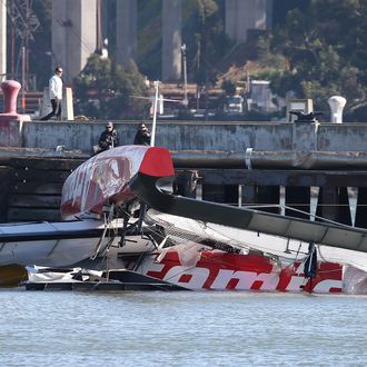 SAN FRANCISCO, CA - MAY 09: The bottom of the Artemis Racing AC-72 catamaran is seen in the water at Hangar 3 at Treasure Island on May 9, 2013 in San Francisco, California. British sailor Andrew Simpson, a member of the Swedish America's Cup racing team died when he was submerged underwater for 10 minutes after the team's racing boat capsized on the San Francisco Bay. (Photo by Justin Sullivan/Getty Images)