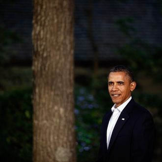 CAMP DAVID, MD - MAY 18: U.S. President Barack Obama waits to greet G8 leaders in front of Laurel Lodge at Camp David during the 2012 G8 Summit on Friday, May 18, 2012 in Camp David, Maryland. Leaders of eight of the worlds largest economies meet over the weekend in an effort to keep the lingering European debt crisis from spinning out of control. (Photo by Luke Sharrett/ The New York Times-Pool/Getty Images)