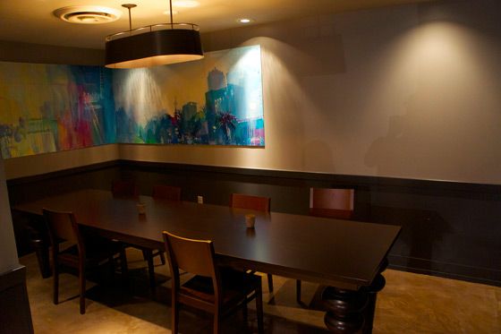 A semi-private dining area at the rear.