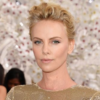 PARIS, FRANCE - JULY 07: Charlize Theron attends the Christian Dior show as part of Paris Fashion Week - Haute Couture Fall/Winter 2014-2015 on July 7, 2014 in Paris, France. (Photo by Pascal Le Segretain/Getty Images)