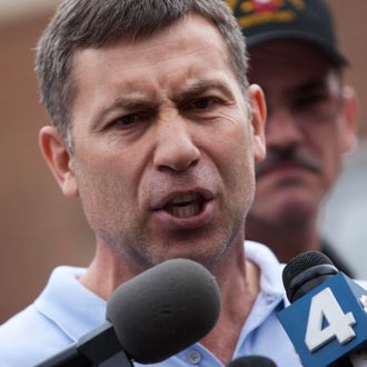 Ruslan Tsarni, uncle of the suspected Boston Marathon bombing suspects, speaks to reporters in front of his home April 19, 2013 in Montgomery Village, Maryland. Tsarni asked the still at large bombing suspect Dzhokhar Tsarnaev to turn himself in. 