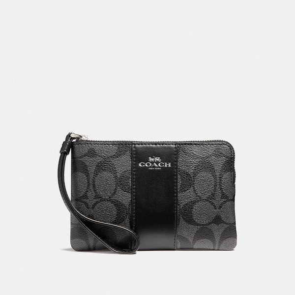 Coach Corner Zip Wristlet In Signature Canvas