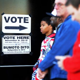 People wait in line to vote before the polling station at the Clark County Fire Training Center opens on November 6, 2012 in Las Vegas, Nevada. Voting is underway in the battleground state of Nevada as President Barack Obama and Republican nominee former Massachusetts Gov. Mitt Romney remain in a virtual tie in the national polls. (Photo by David Becker/Getty Images)