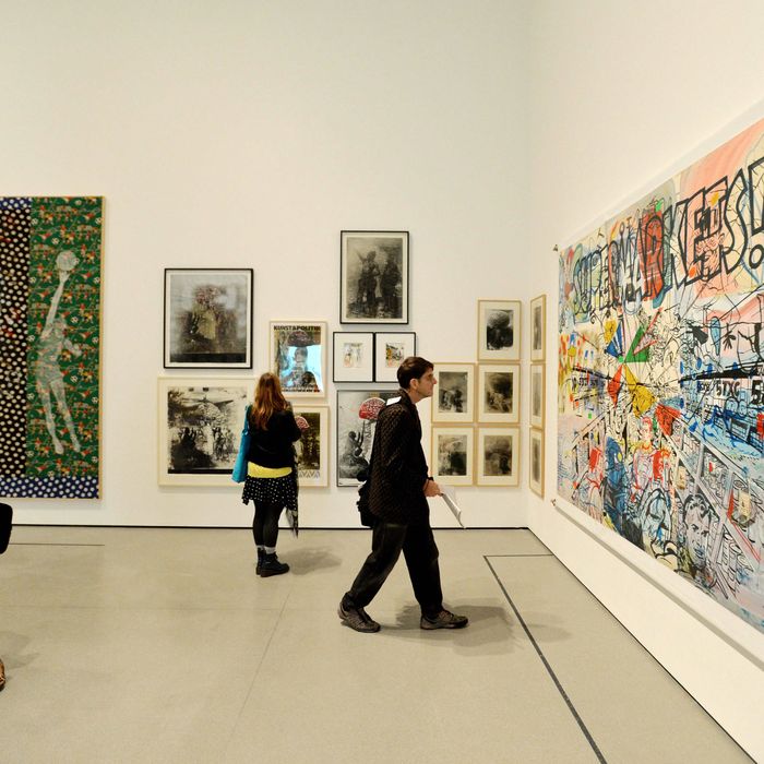 People look at artworks displayed at a major retrospective of German artist Sigmar Polke entitled 'Alibis: Sigmar Polke 1963–2010' during a preview of the show at the Museum of Modern Art in New York, New York, USA, 09 April 2014. 