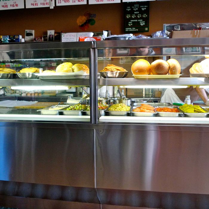 Behold the gleaming case of condiments.