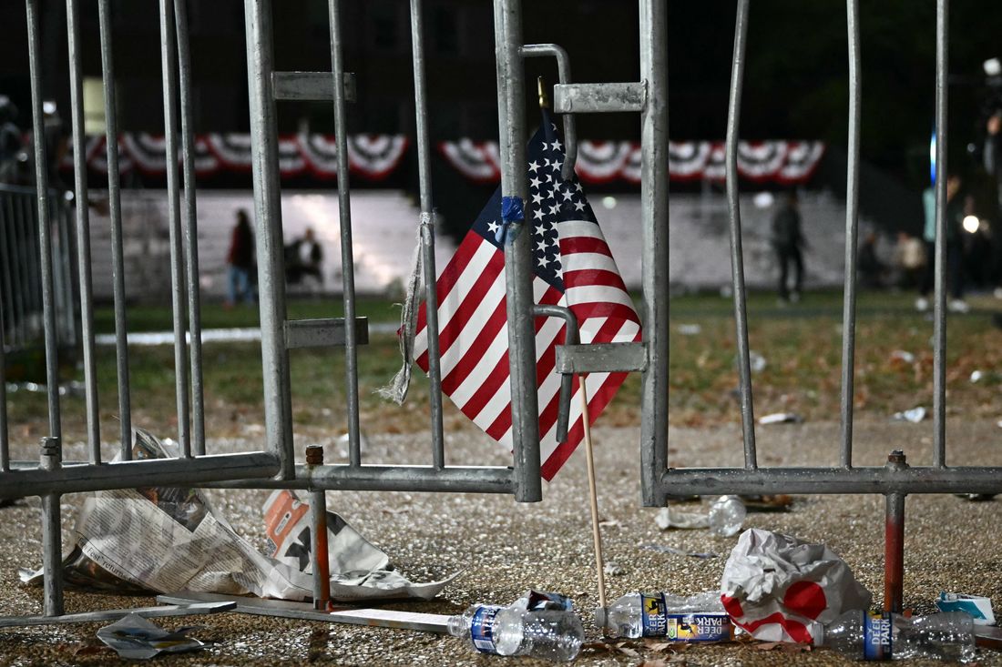 US flags are seen on the ground as people left the election night event for US Vice President and Democratic presidential candidate Kamala Harris