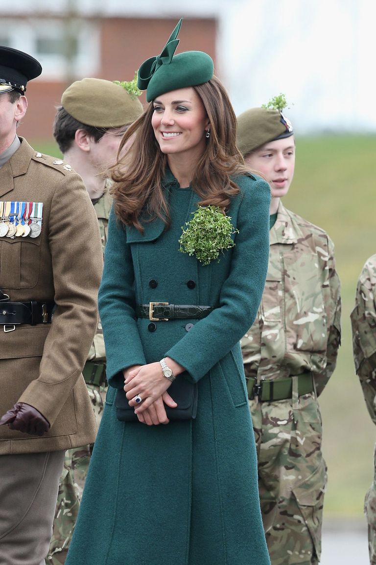 Catherine, Duchess of Cambridge laughs as she attends the St Patrick’s Day parade at Mons Barracks on March 17, 2014 in Aldershot, England. Catherine, Duchess of Cambridge and Prince William, Duke of Cambridge visited the 1st Battalion Irish Guards to present the traditional sprigs of Shamrocks to the Officers and Guardsmen of the Regiment.