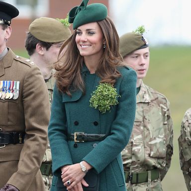 Catherine, Duchess of Cambridge laughs as she attends the St Patrick’s Day parade at Mons Barracks on March 17, 2014 in Aldershot, England. Catherine, Duchess of Cambridge and Prince William, Duke of Cambridge visited the 1st Battalion Irish Guards to present the traditional sprigs of Shamrocks to the Officers and Guardsmen of the Regiment.