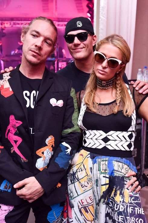 Paris Hilton in baby pink Moschino dress and bag at Art Basel event