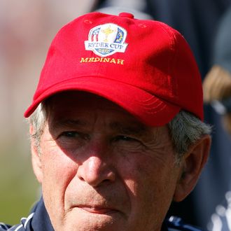 Former U.S. President George W. Bush watches the play during day two of the Afternoon Four-Ball Matches for The 39th Ryder Cup at Medinah Country Club on September 29, 2012 in Medinah, Illinois. (Photo by Jamie Squire/Getty Images)