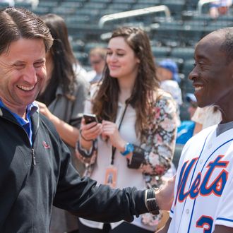 NEW YORK, NY - APRIL 28: COO of the New York Mets Jeff Wilpon (L) and actor Don Cheadle attend the Philadelphia Phillies vs New York Mets game at Citi Field on April 28, 2013 in New York City. (Photo by Michael Stewart/Getty Images)