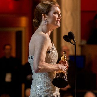 Actress Julianne Moore, winner of the Best Actress in a Leading Role Award for 'Still Alice', appears onstage at the 87th Annual Academy Awards at Dolby Theatre on February 22, 2015 in Hollywood, California. 