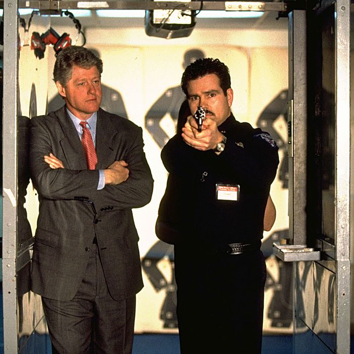 President Bill Clinton with a police officer.