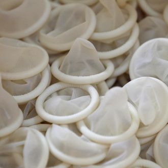 Condoms are seen on the production line at the Unidus Corp. factory in Jeungpyeong, South Korea, on Tuesday, Aug. 6, 2013. 