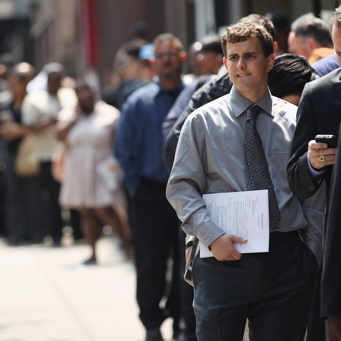 NEW YORK, NY - JUNE 11: Applicants wait to enter a job fair on June 11, 2012 in New York City. Some 400 people arrived early for the event held by National Career Fairs, and up to 1,000 people were expected by the end of the day. (Photo by John Moore/Getty Images)