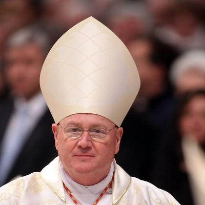 VATICAN CITY, VATICAN - FEBRUARY 19: Newly Appointed cardinal Timothy Michael Dolan Archbishop of New York attends a mass held by pope Benedict XVI in St. Peer's Basilica on February 19, 2012 in Vatican City, Vatican. The 84 year old Pontiff installed 22 new cardinals during his fourth concistory, who will be responsible for choosing his sucessor. (Photo by Franco Origlia/Getty Images)