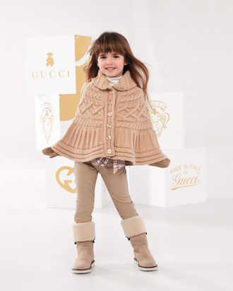 A fabulous Gucci-wearing child.