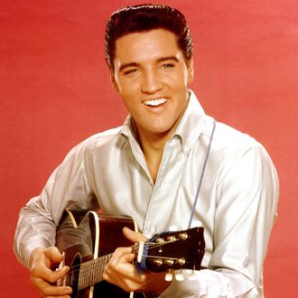 Elvis Presley portrait with acoustic guitar