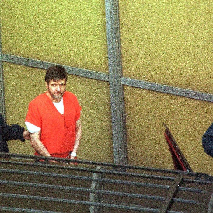 Unabomber suspect Theodore Kaczynski (C) is lead out by armed US marshalls at the Federal Courthouse 22 January in Sacramento, CA. Kaczynski admitted he was the Unabomber, pleading guilty to all counts. 