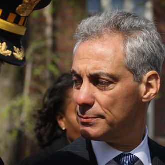 Chicago Mayor Rahm Emanuel listens as Police Superintendent Garry McCarthy (L) speaks prior to a press conference to announce the results of two investigations that led to gang and drug arrests on the city's Westside March 26, 2012 in Chicago, Illinois. The arrests are part of an effort by the city to crack down the increasingly violent gang culture in Chicago. Earlier this month the city recorded 49 shootings with 10 fatalities over one weekend, followed up on Monday with the shooting of Chicago police officer by a twenty-year-old man alleged by police to be a gang member. 