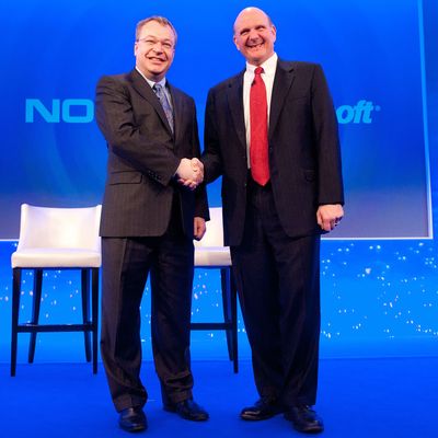 Nokia Chief Executive Stephen Elop (L) shakes hands with Microsoft CEO Steve Ballmer (R) during the Nokia Strategy and Financial Briefing at the Intercontinental Hotel in central London, on February 11, 2011. Nokia, the world's largest mobile phone maker, said Friday it was joining forces with US giant Microsoft in a major corporate strategy shake-up that left investors disappointed. The Finnish phone maker said Microsoft's Windows Phone would now serve as its primary smartphone platform in a 