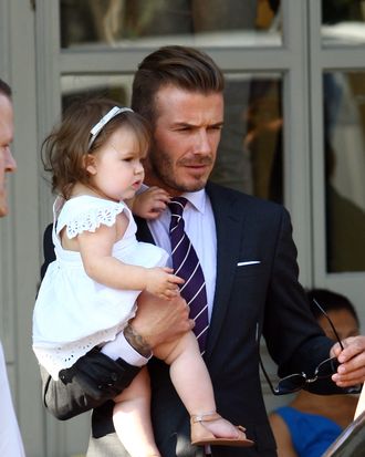 David Beckham and Harper Beckham seen at 202 Restaurant in Notting Hill on July 26, 2012 in London, England.
