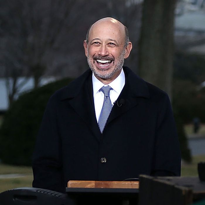 Chairman and CEO of Goldman Sachs Group Lloyd Blankfein speaks during a TV interview after a meeting with U.S. President Barack Obama February 5, 2013 in Washington, DC. Obama was meeting with business leaders to discuss issues including immigration reform, economy, and deficit reduction.