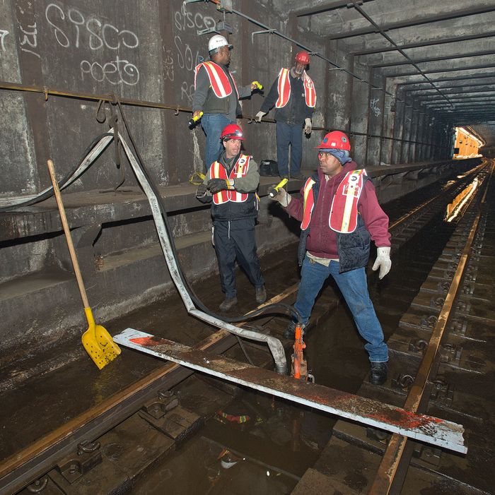 New York City Transit employees are pumping water out of the flooded A Line tunnel near Dyckman Street in Upper Manhattan.